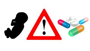 Silueta de bebé, signo de peligro e imagen de pastillas