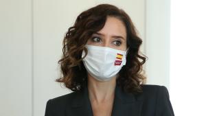 Primer plano de la presidenta con mascarilla 