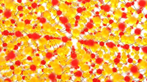 Malla de enlaces químicos de moléculas de color amarillo, naranja y rojo