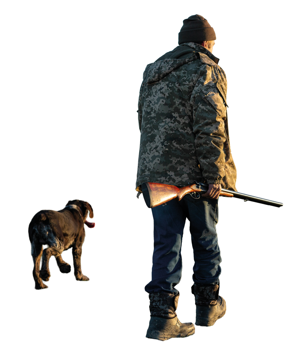 Imagen de cazador de espaldas con perro