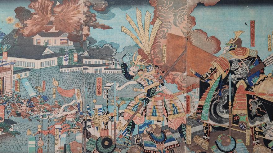 Ciudad amurallada japonesa asediada por samurais