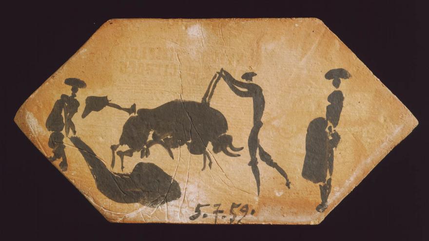 Ladrillo hexagonal con dibujo de toreros y toros en una corrida