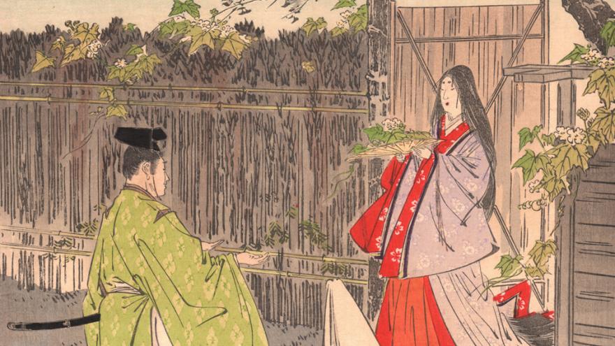 Mujer japonesa ofrece una flor a hombre que espera con las manos extendidas