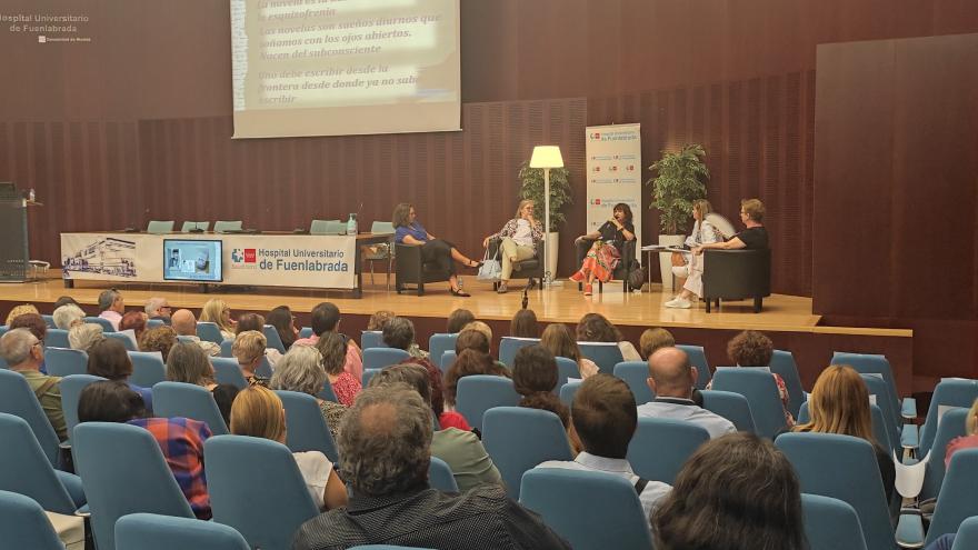 Personas en un auditorio