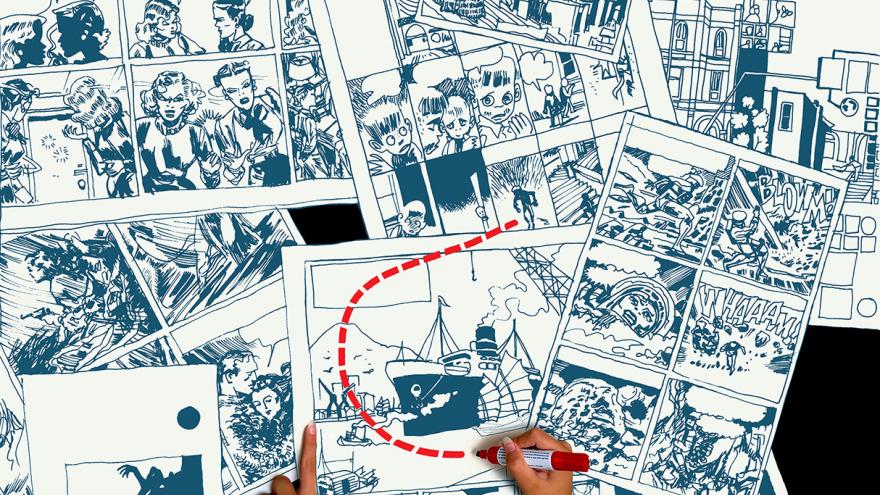 Unas manos pintan en las páginas de un cómic