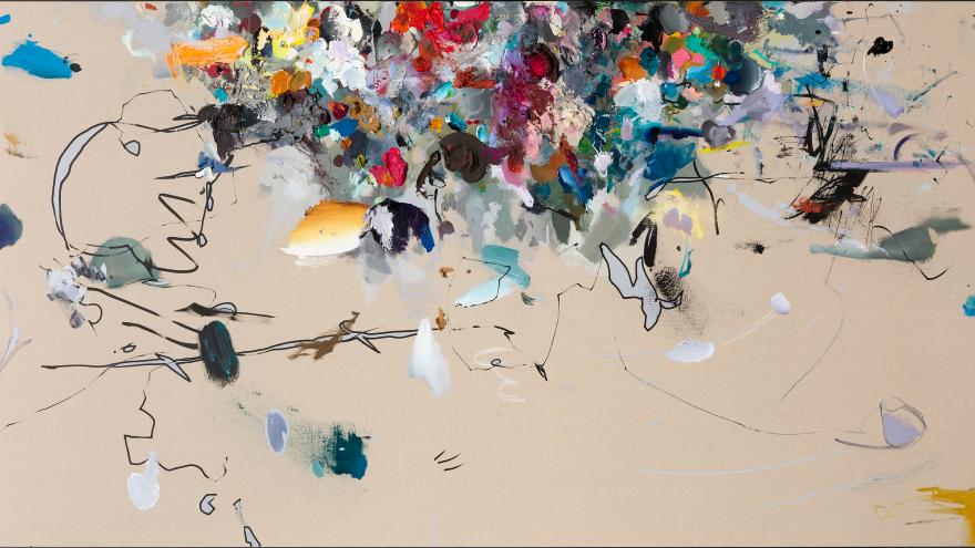 Imagen abstracta con luego en color beige y manchas de colores