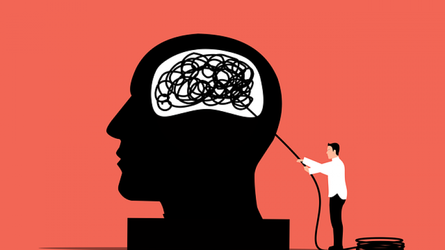Icono de una cabeza con un cerebro enmarañado y un sanitario desenmarañando