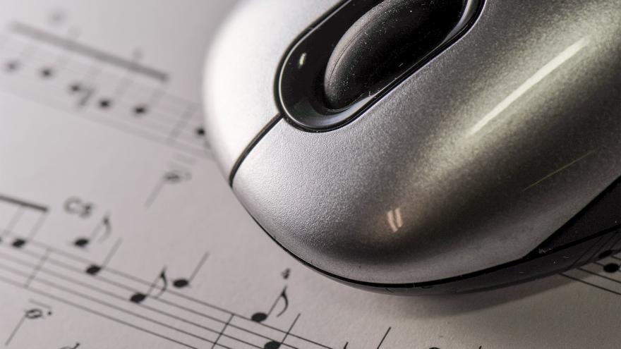 Ratón sobre partitura