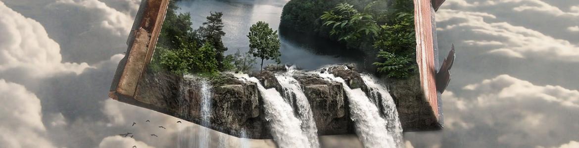 Libro abierto con un paisaje con agua a doble página del que cae agua en forma de cascada