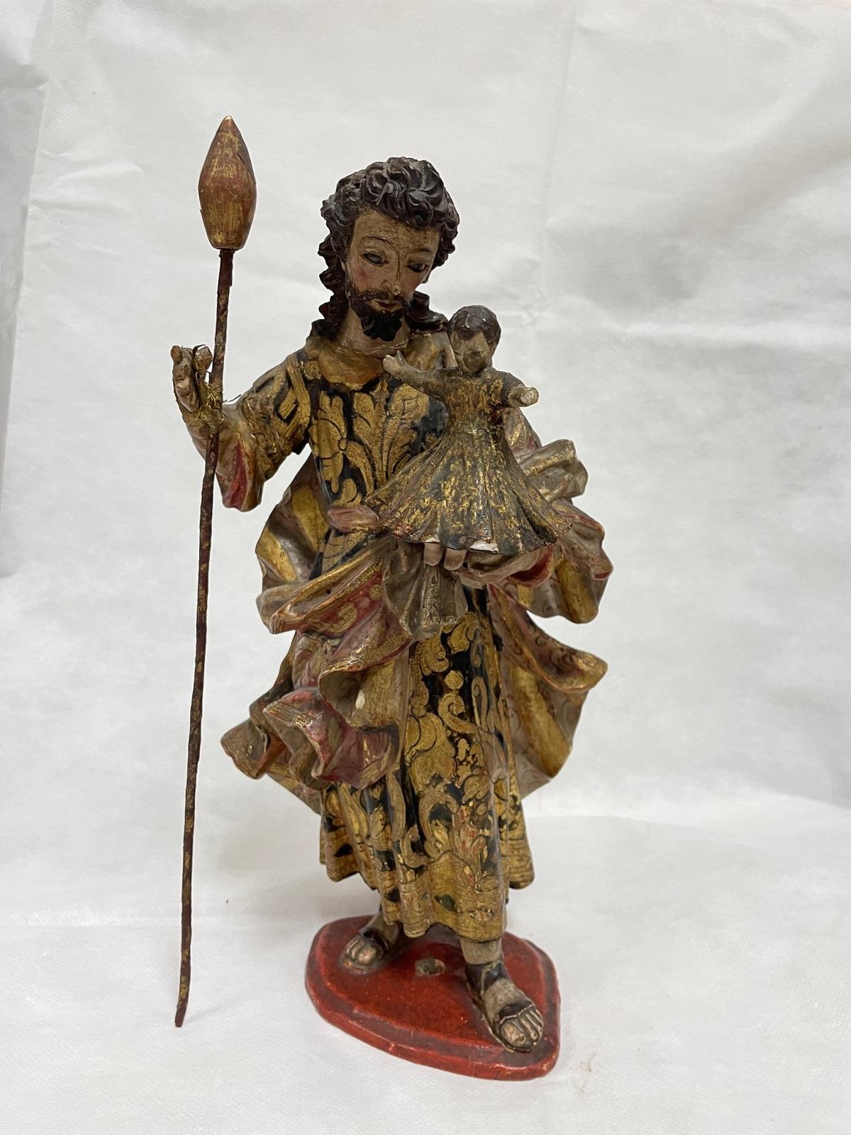 Talla de San José con el Niño Jesús antes de su restauración