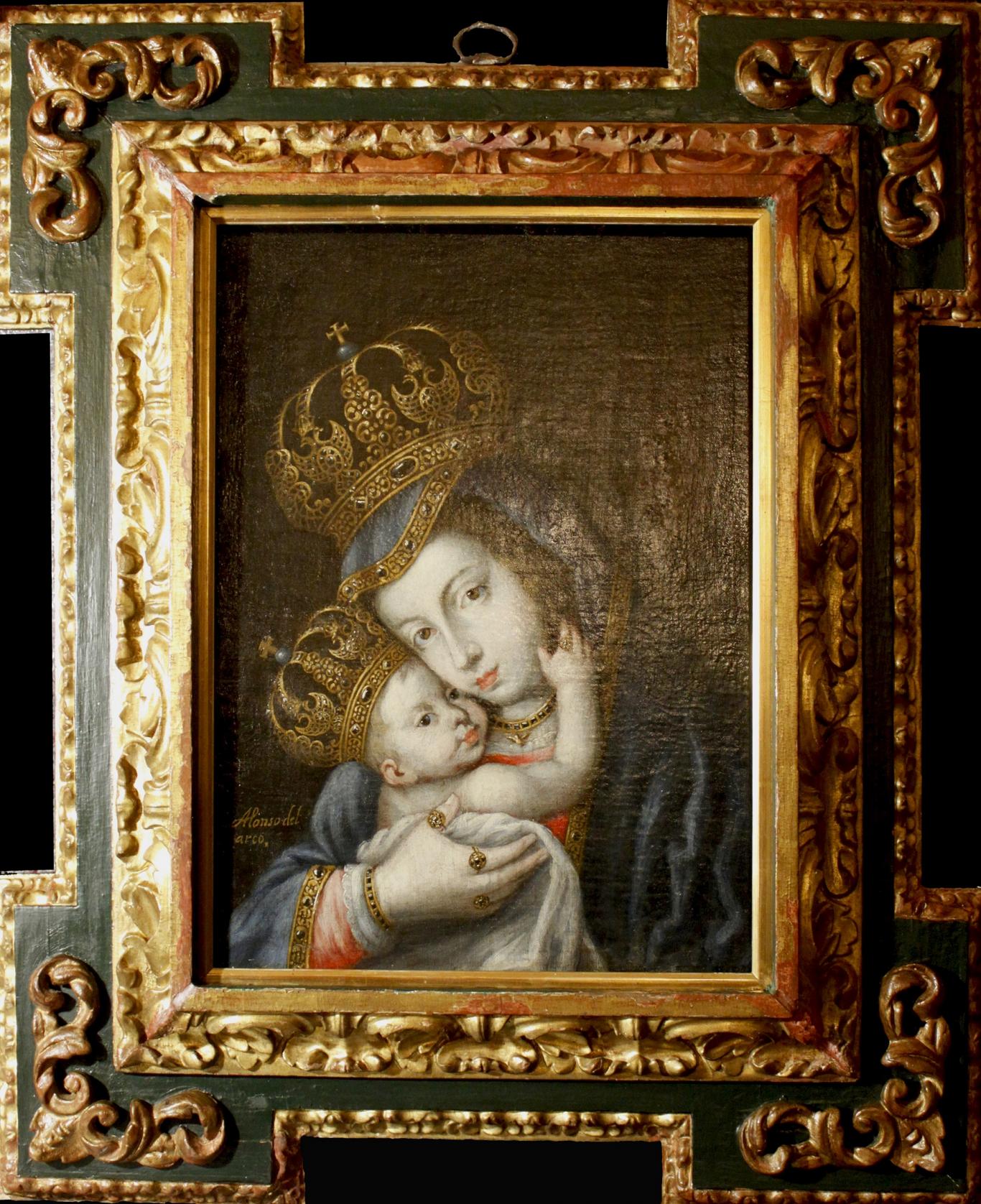 Óleo sobre lienzo representando a virgen coronada con niño enmarcados en un marco decorado