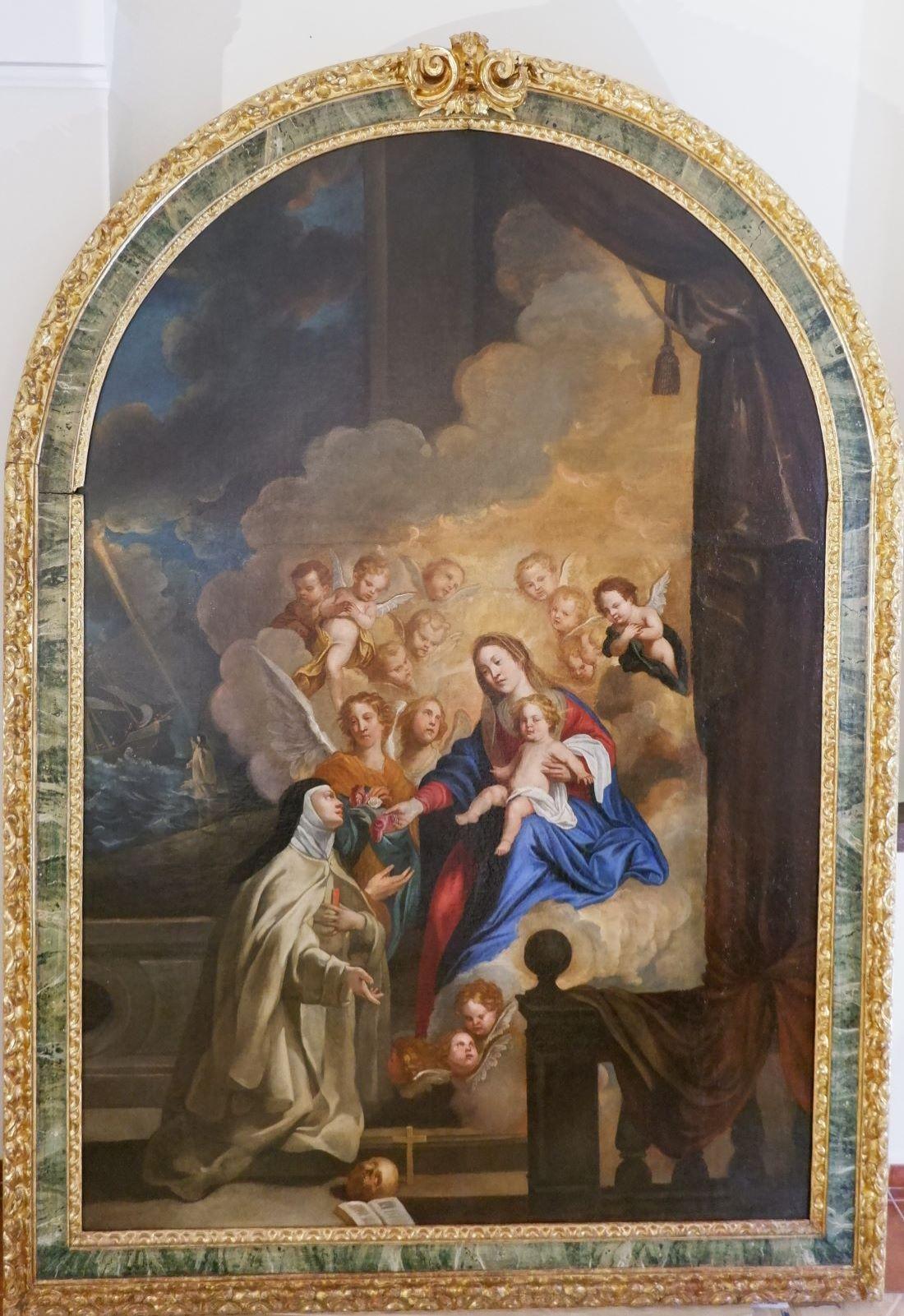 Pintura que representa la virgen María con el niño Jesús recibiendo a una mujer con hábitos religiosos rodeadas por un coro de ángeles