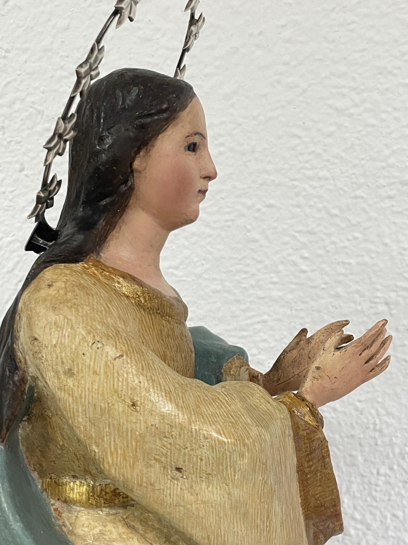 Talla de la Inmaculada Concepción después de la restauración