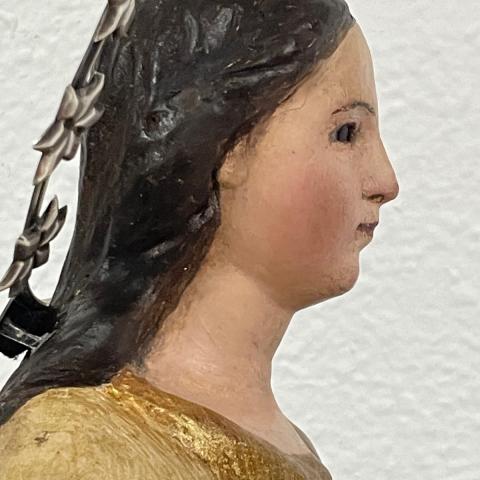 Cara de la Inmaculada Concepción, de perfil, después de la restauración